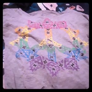 A short sleeve naive tribe theme shirt to small fo